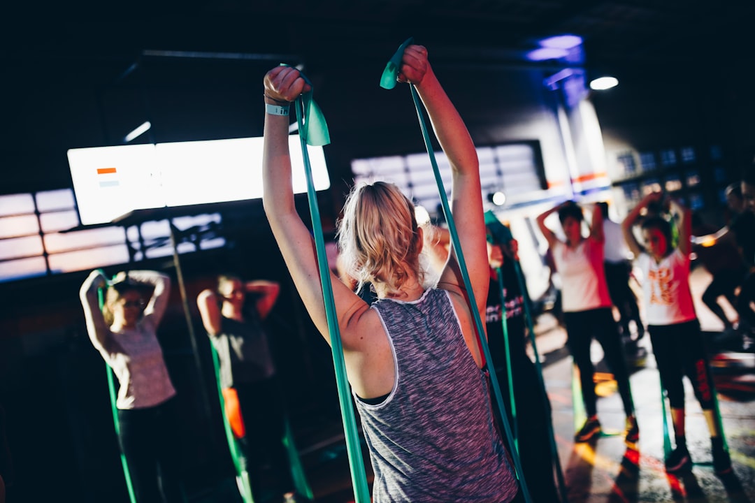 group of people in gym while exercising — Foto por Geert Pieters na Unsplash