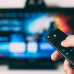 turned-on flat screen television — Foto por Glenn Carstens-Peters na Unsplash
